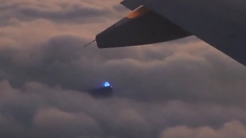Glowing Blue Dome UFO Captured From Passenger Plane